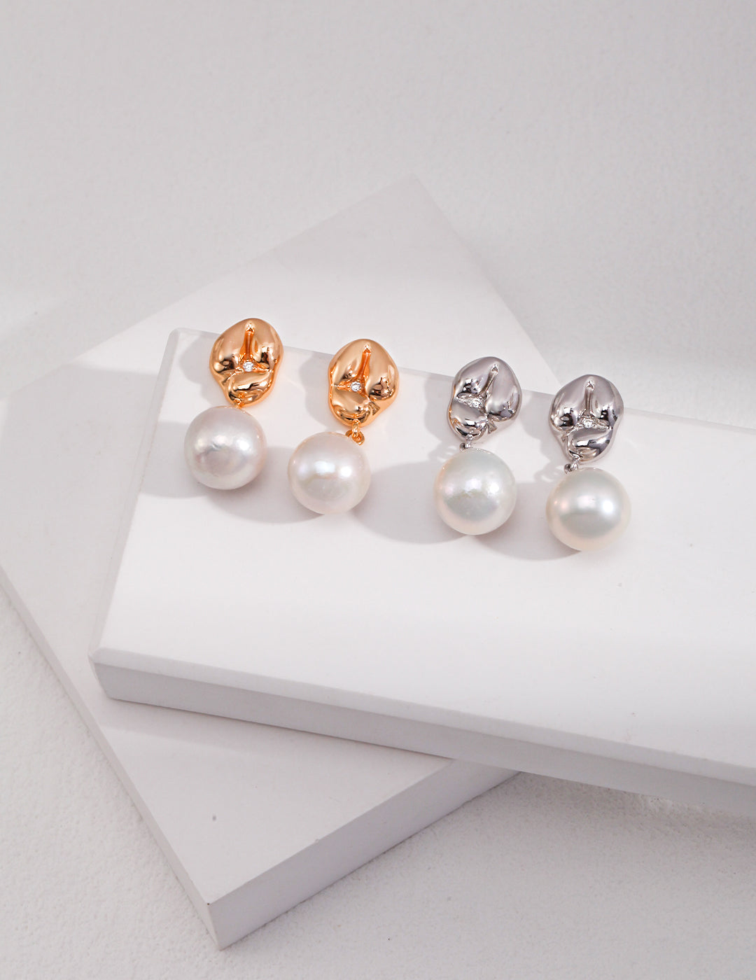 Playful Silver Pearl Earrings with Zircon Accent