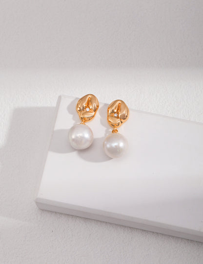 Playful Silver Pearl Earrings with Zircon Accent