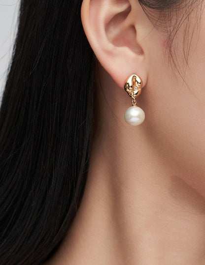 Playful Silver Pearl Earrings with Zircon Accent